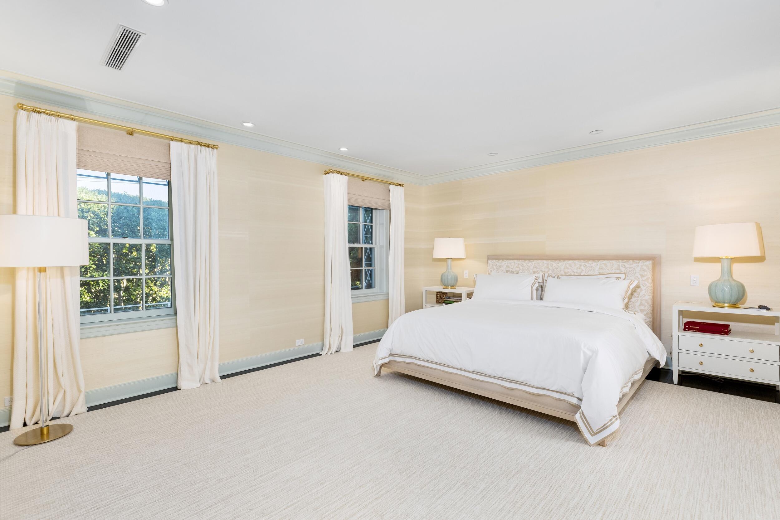 130 Cocoanut Row Palm Beach, FL 33480 - Photo 36 of 66 a spacious bedroom with a bed and large window