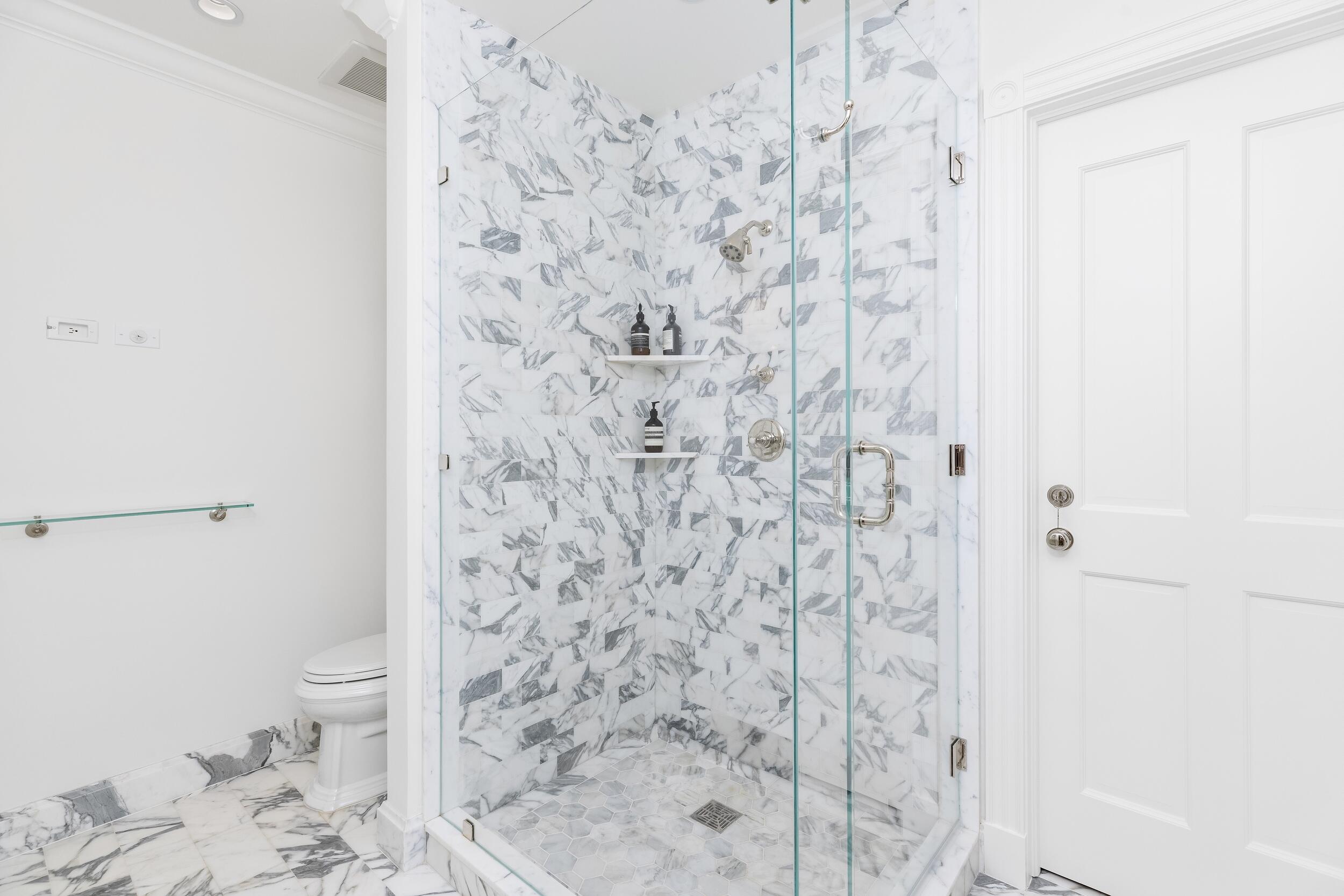 130 Cocoanut Row Palm Beach, FL 33480 - Photo 46 of 66 a bathroom with a toilet and a shower