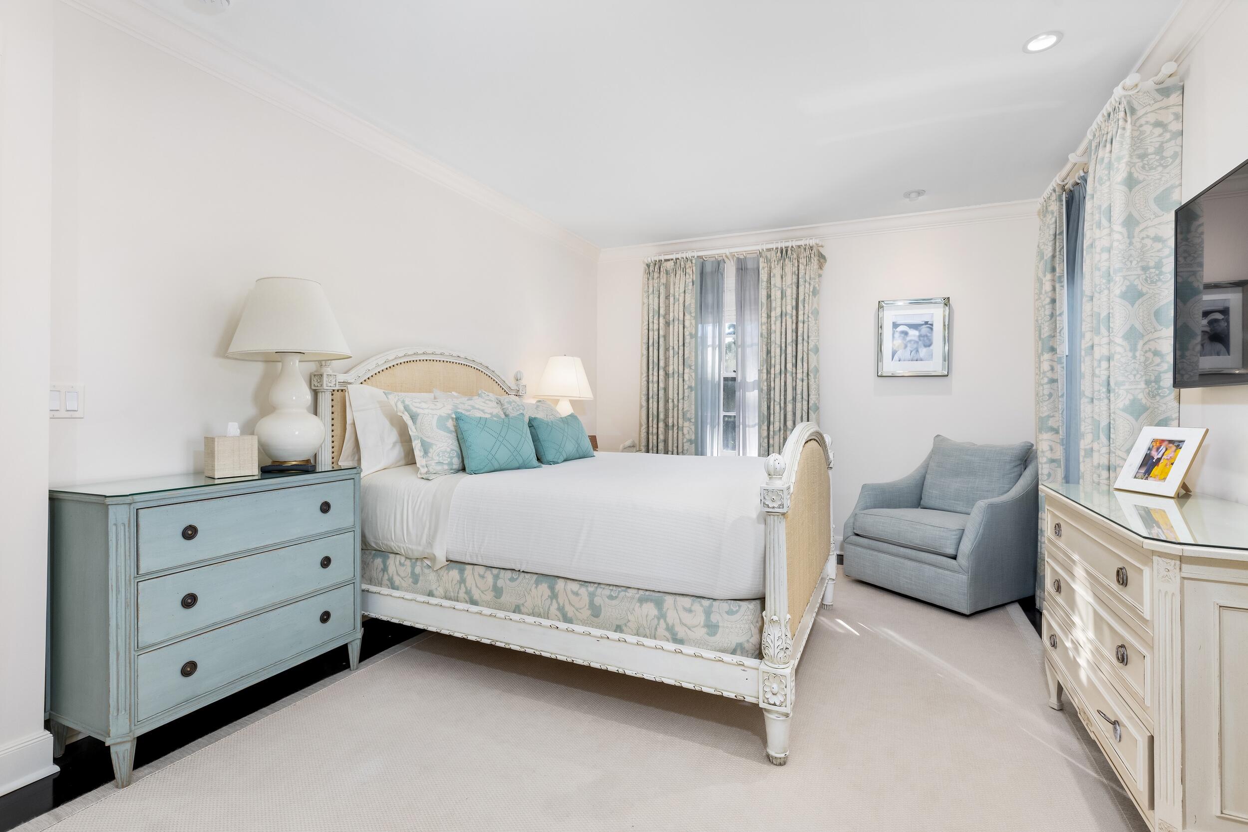 130 Cocoanut Row Palm Beach, FL 33480 - Photo 47 of 66 a bedroom with a bed and a couch