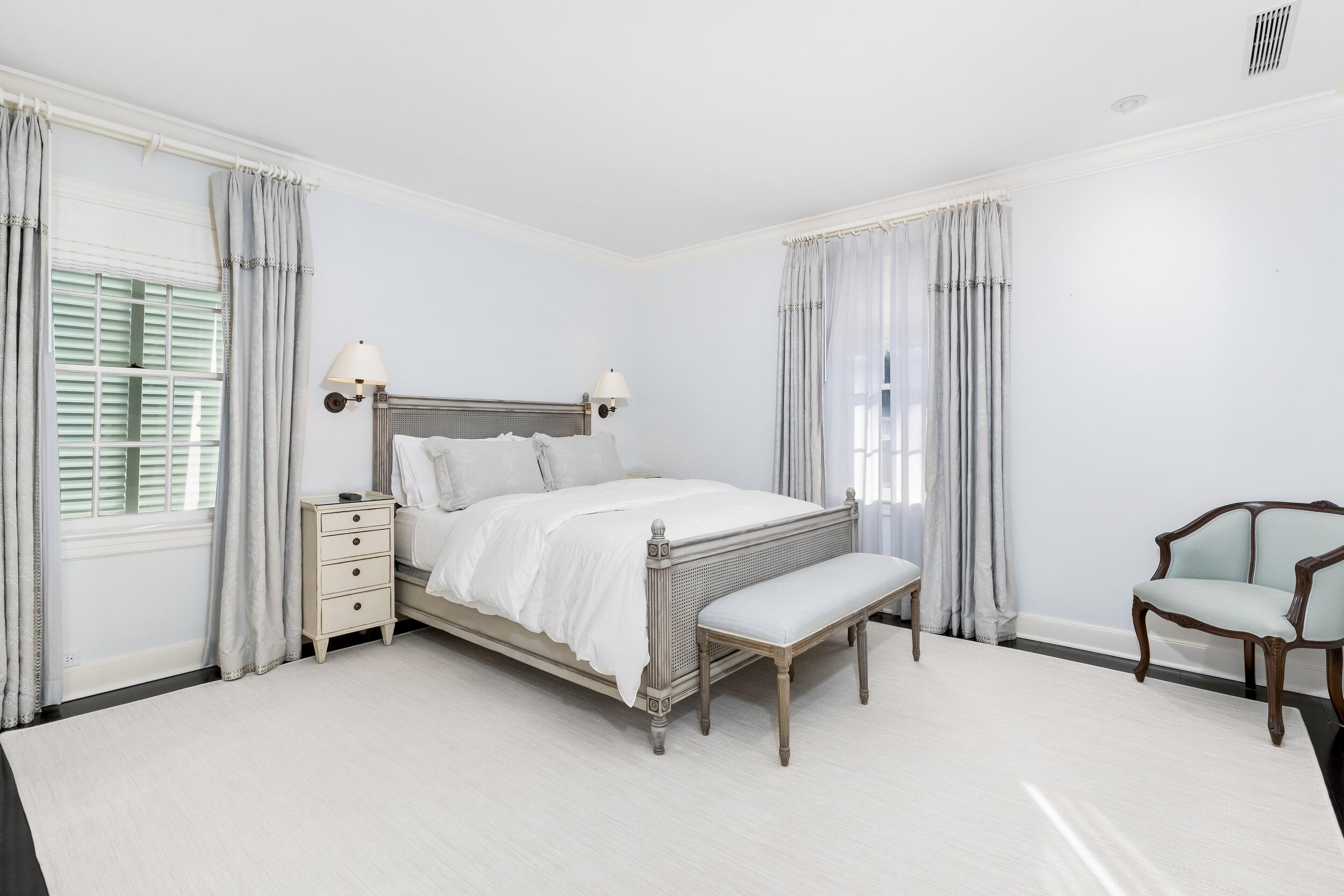 130 Cocoanut Row Palm Beach, FL 33480 - Photo 49 of 66 a bedroom with a bed chair and a window