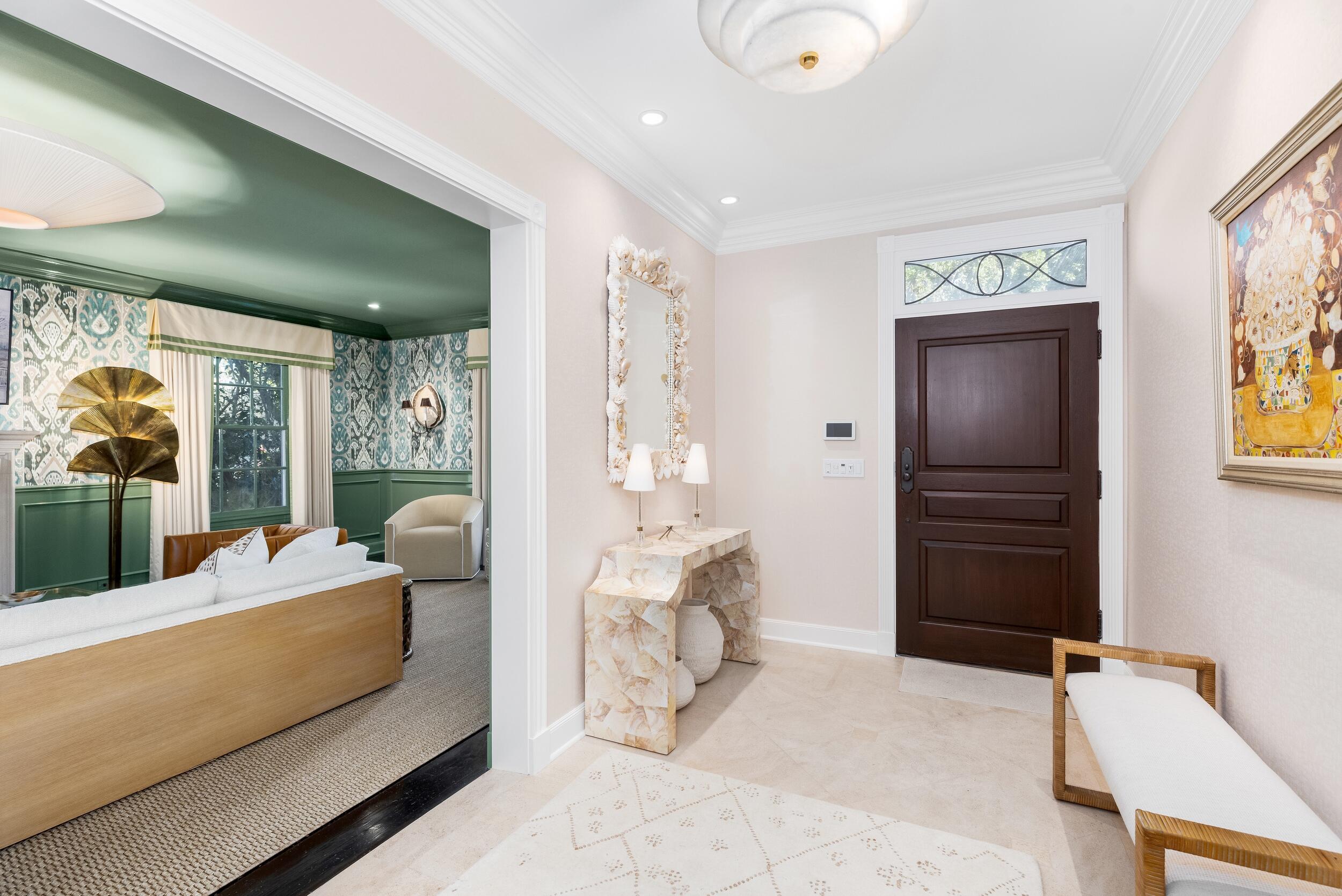 130 Cocoanut Row Palm Beach, FL 33480 - Photo 5 of 66 a living room with furniture and a flat screen tv