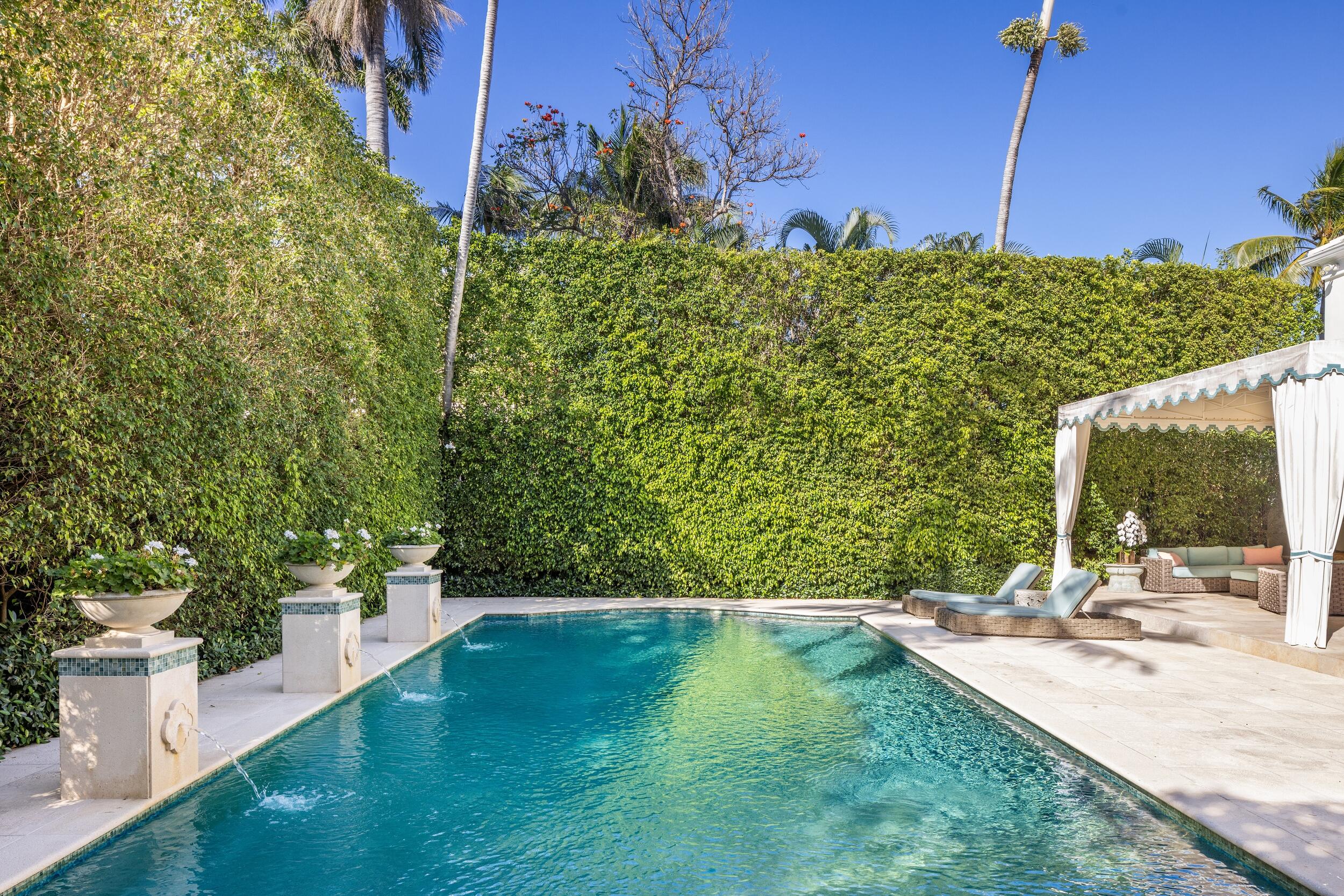 130 Cocoanut Row Palm Beach, FL 33480 - Photo 55 of 66 a view of a house with a yard