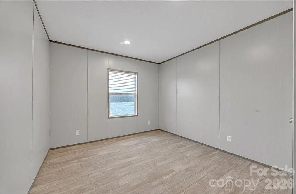 4935 Rhoney Road Connelly Springs, NC 28612 - Photo 24 of 36 a view of an empty room with a window