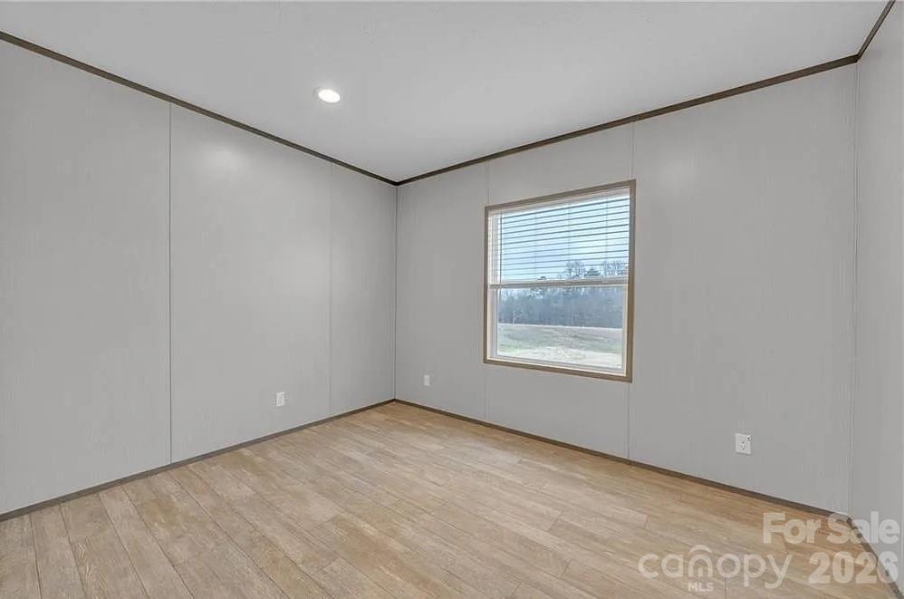 4935 Rhoney Road Connelly Springs, NC 28612 - Photo 27 of 36 a view of an empty room with a window