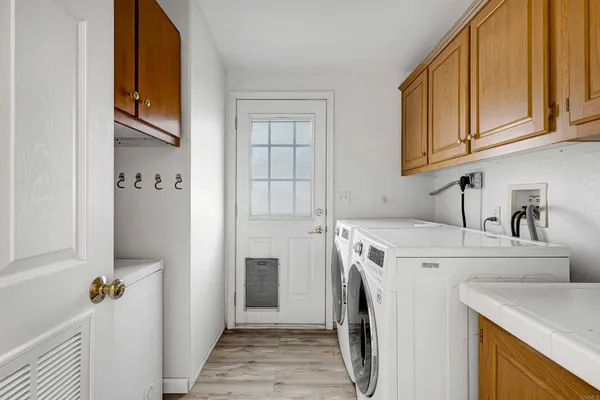 wooden floor and cabinet in a room