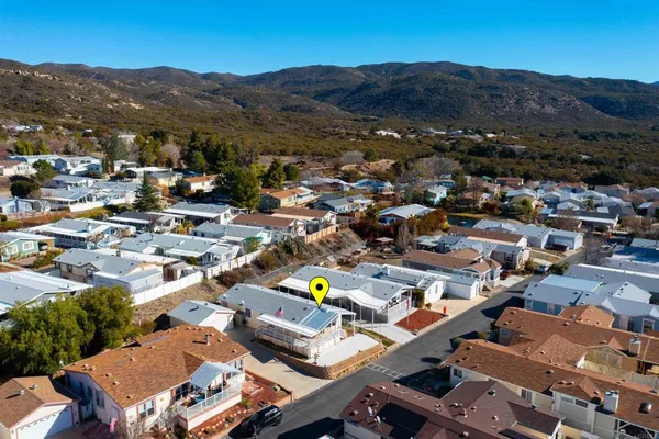 a view of a lake with mountains in the background