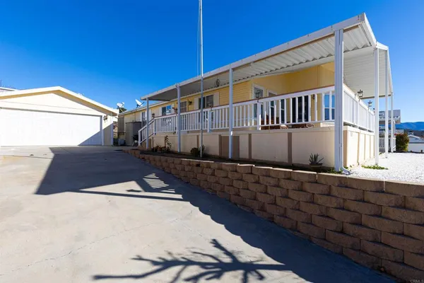 a view of a back yard of the house