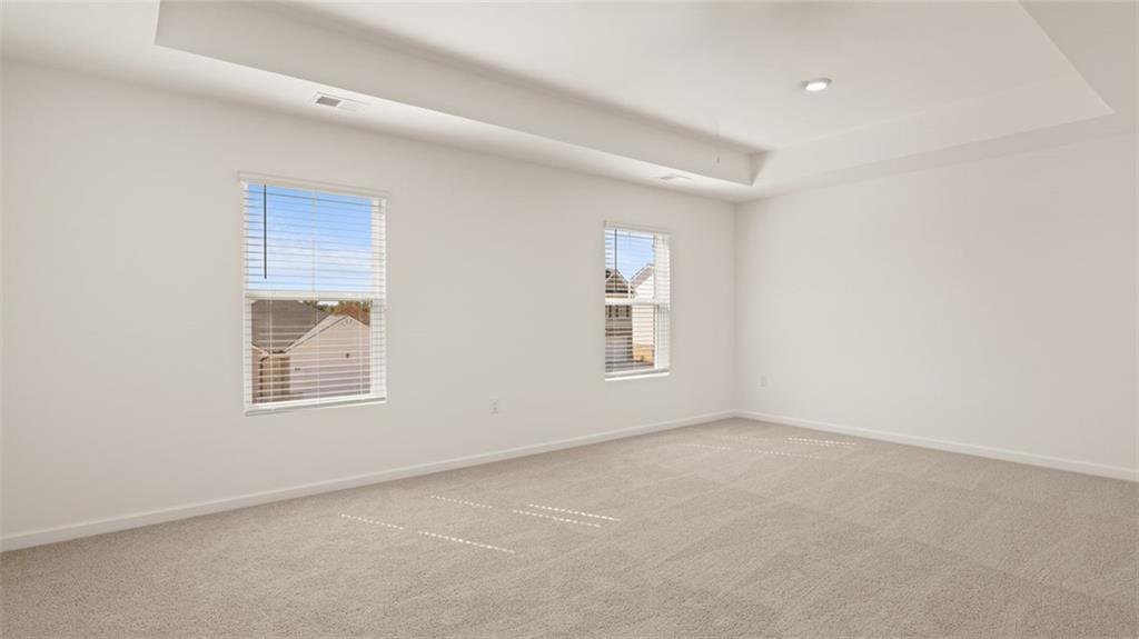 81 White Spruce Way Newnan, GA 30265 - Photo 18 of 39 an empty room with a window