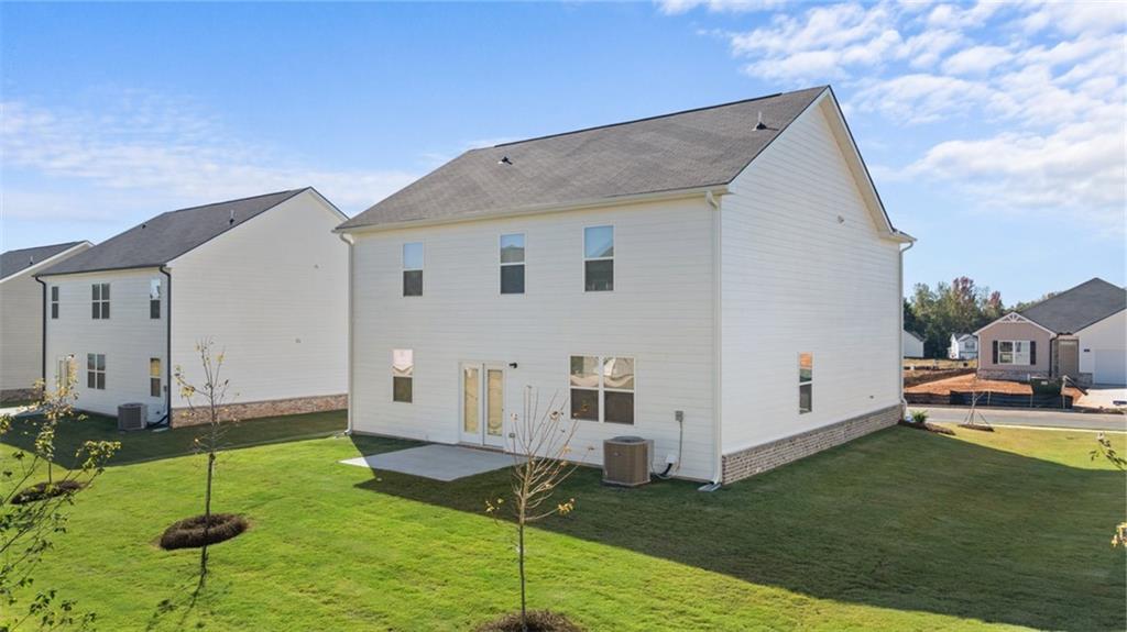 81 White Spruce Way Newnan, GA 30265 - Photo 38 of 39 a view of a house with backyard