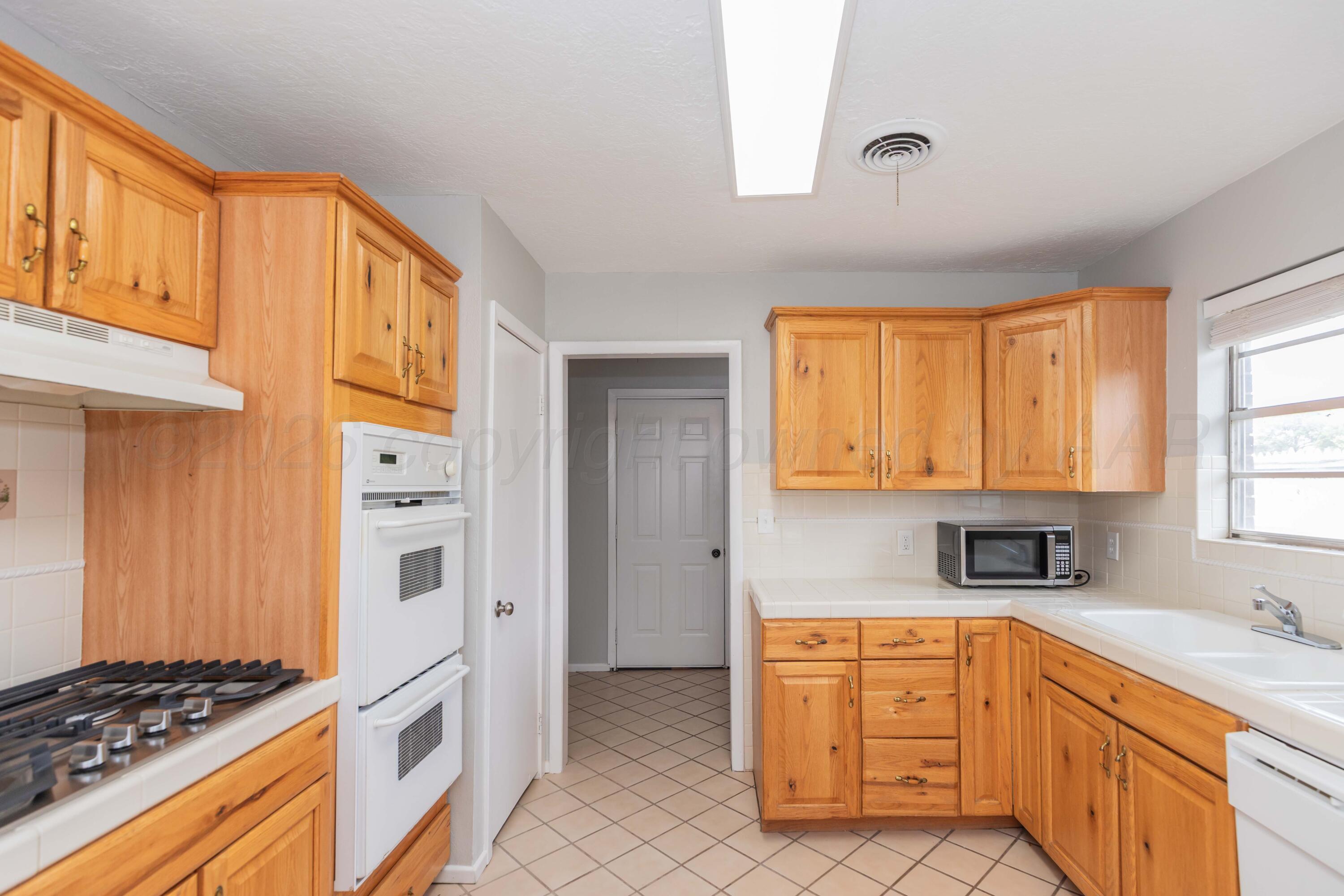 2710 Emory Drive Amarillo, TX 79110 - Photo 6 of 34 KITCHEN VIEW 2