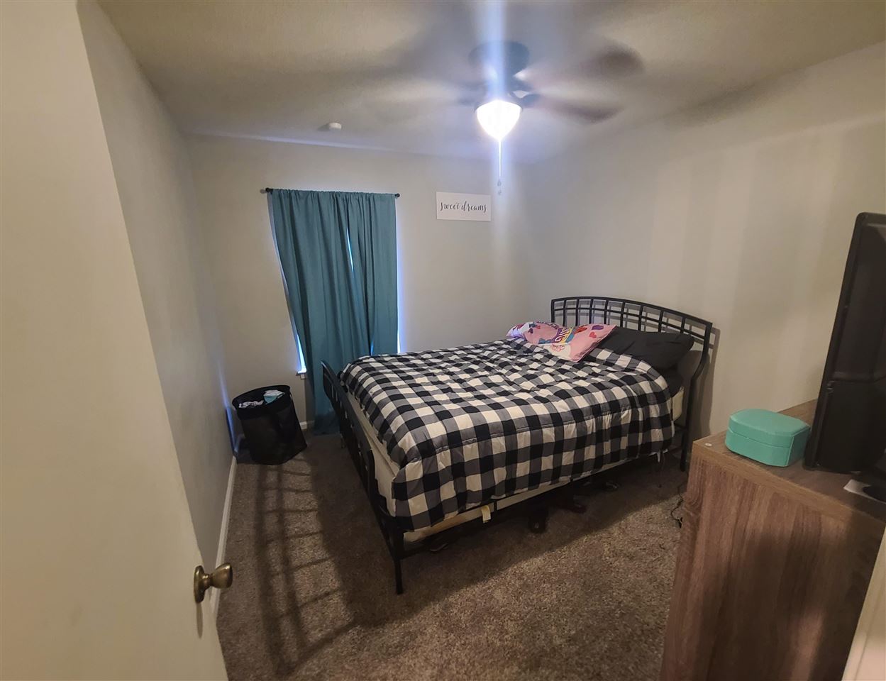 915 Greenview Road Collierville, TN 38017 - Photo 4 of 13 a bedroom with a bed and a mirror