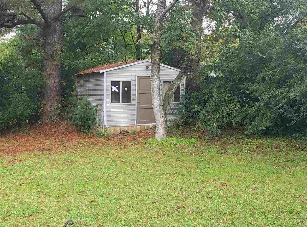 915 Greenview Road Collierville, TN 38017 - Photo 10 of 13 a view of a house with a yard