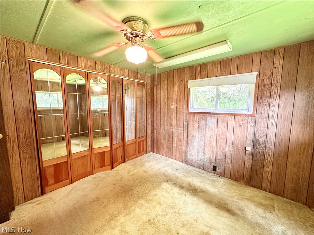 28 Richter Road Colliers, WV 26035 - Photo 10 of 38 Bedroom featuring ceiling fan and carpet flooring