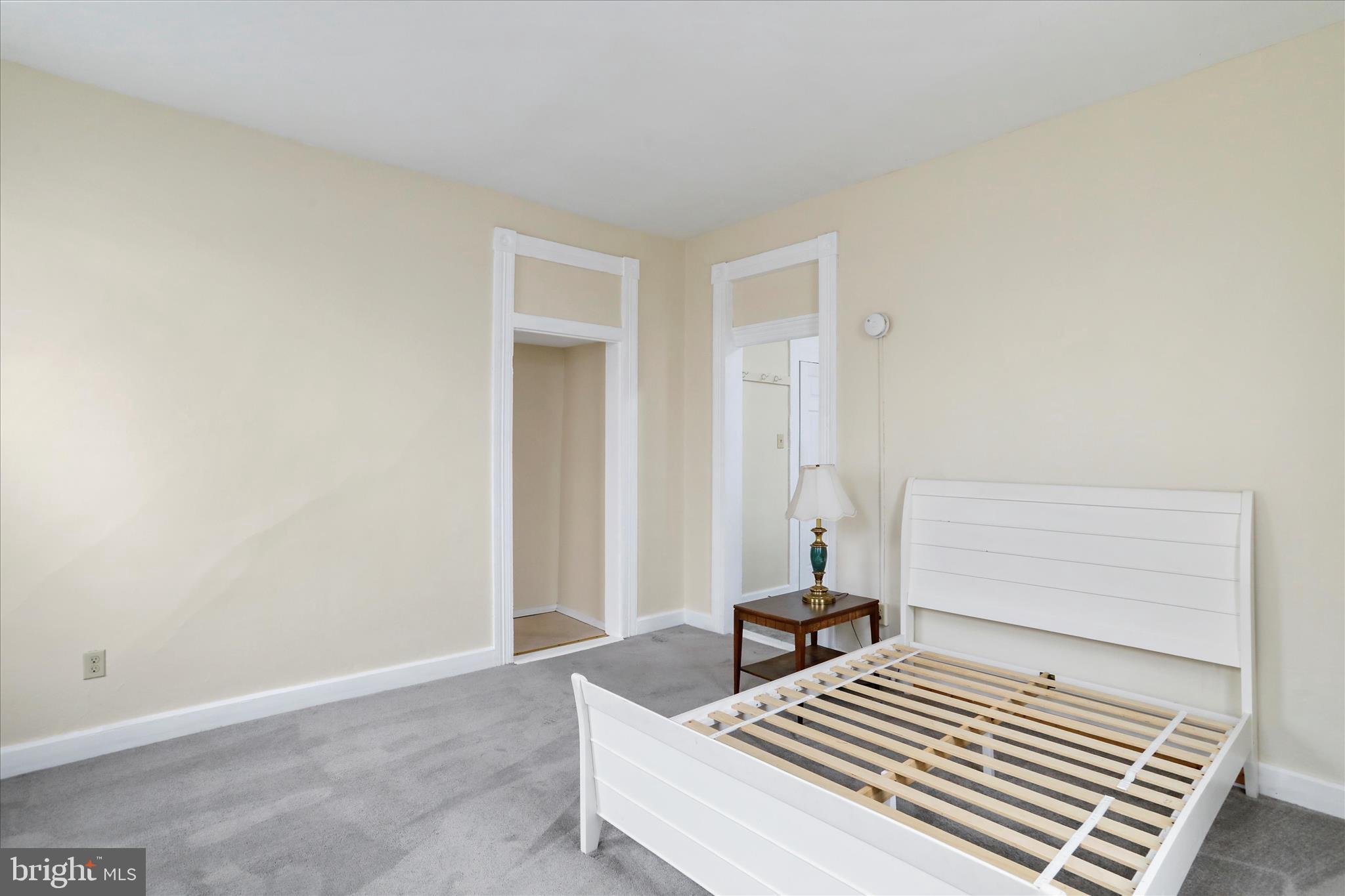 315 Frederick Street Cumberland, MD 21502 - Photo 13 of 46 a bedroom with a bed and a window