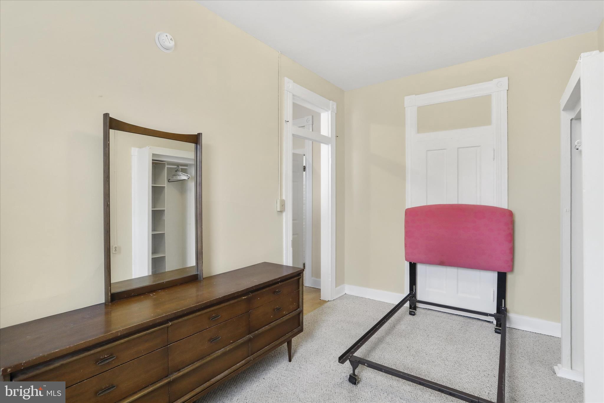 315 Frederick Street Cumberland, MD 21502 - Photo 20 of 46 a room with a chair and a potted plant