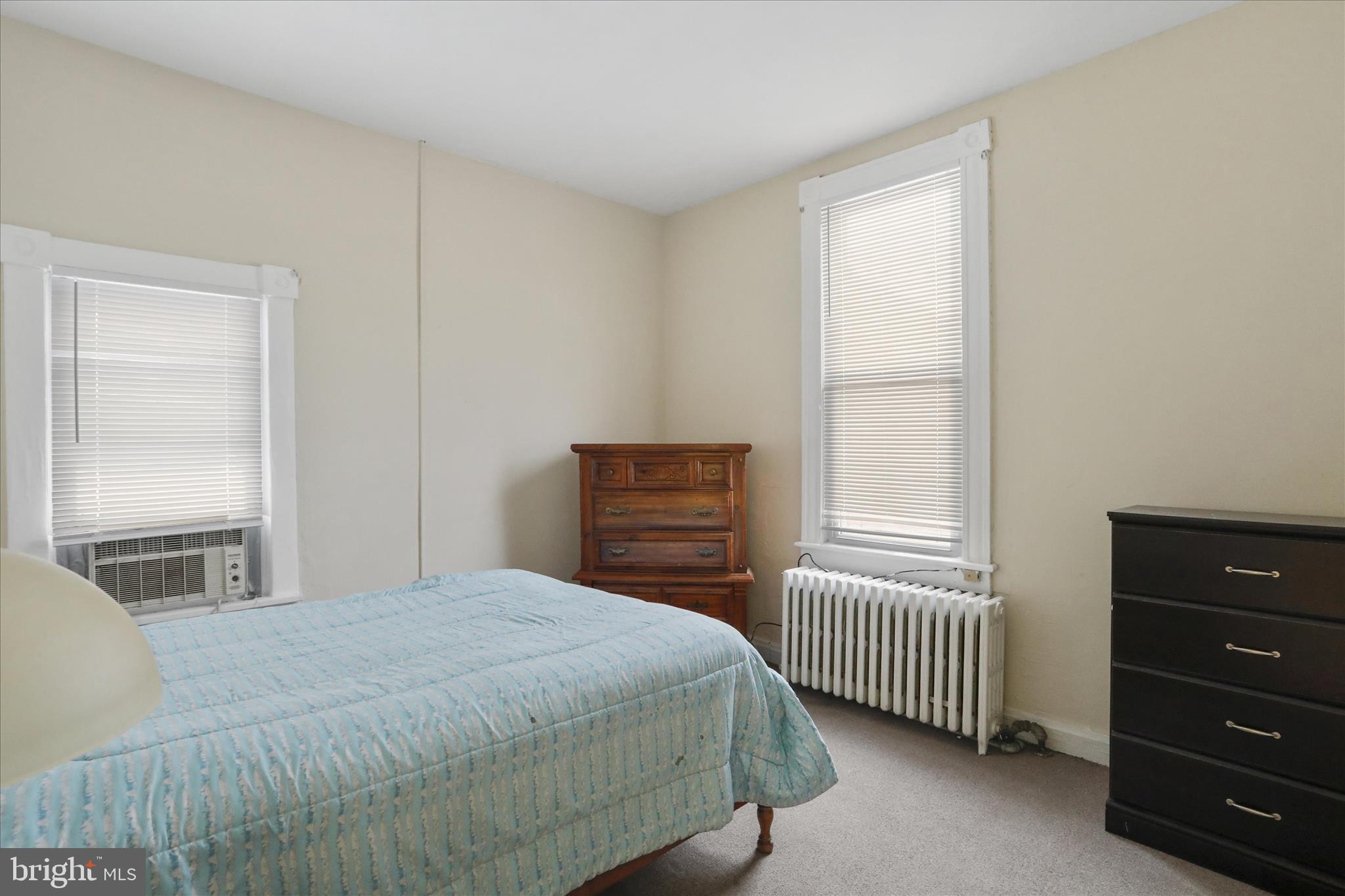 315 Frederick Street Cumberland, MD 21502 - Photo 25 of 46 a bedroom with a bed and a window