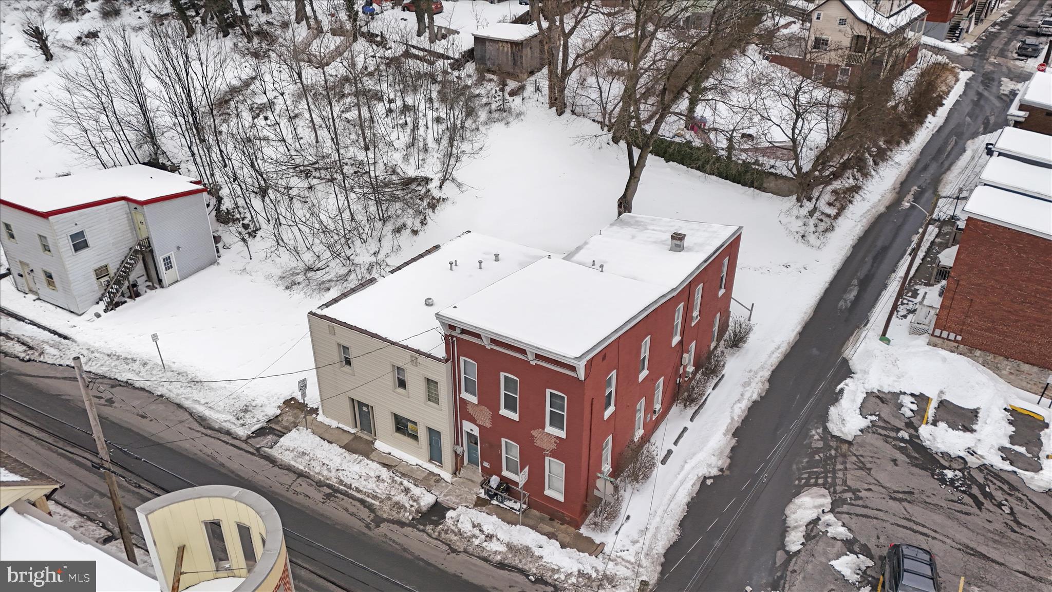 315 Frederick Street Cumberland, MD 21502 - Photo 3 of 46 a view of a house with a roof deck