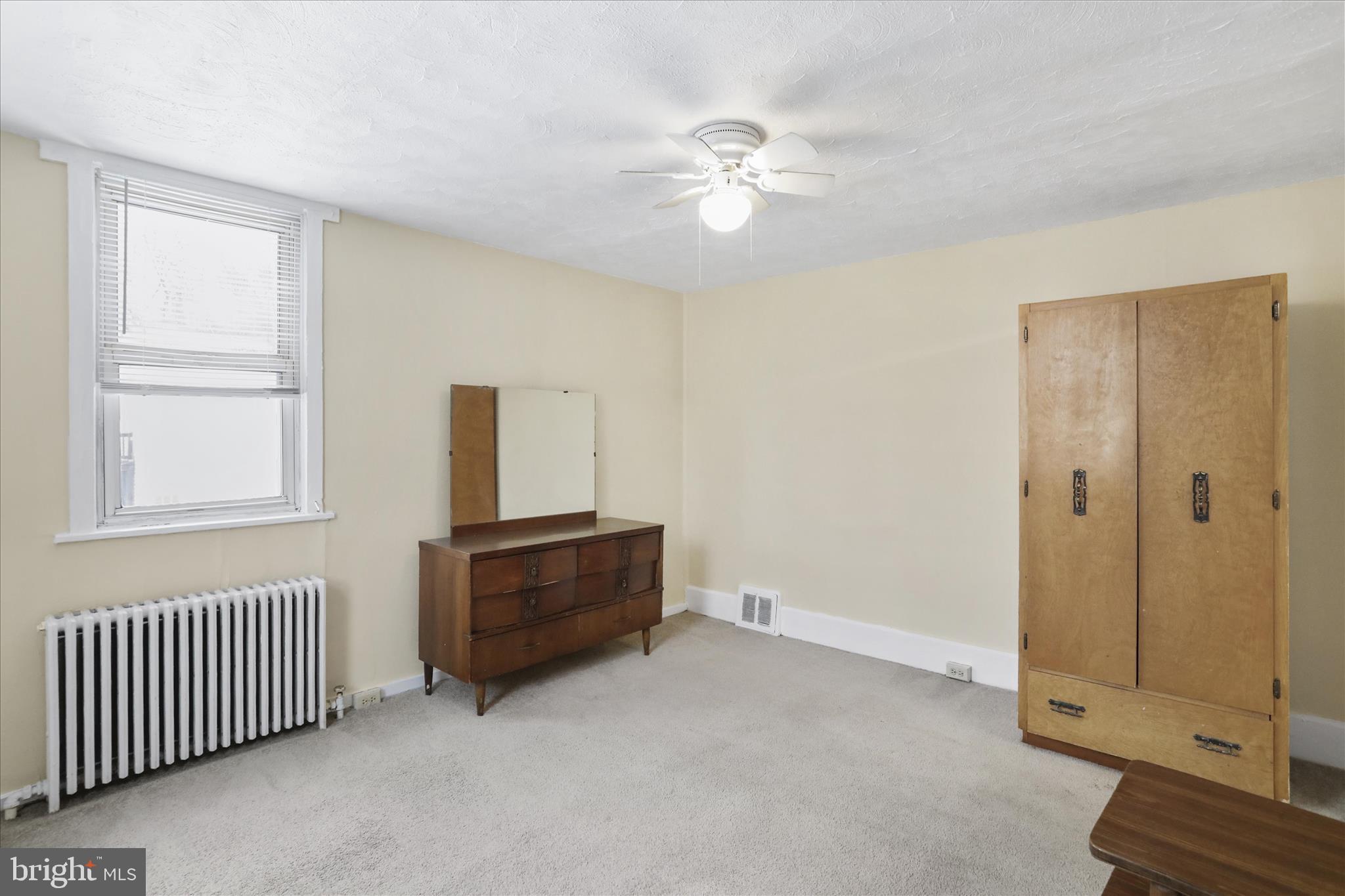 315 Frederick Street Cumberland, MD 21502 - Photo 38 of 46 a view of a livingroom with a chandelier fan and windows