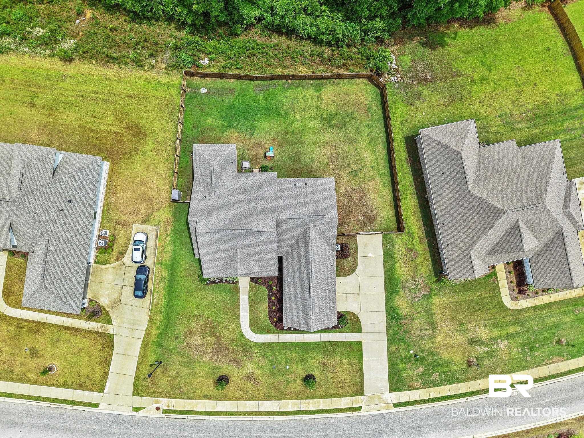 13233 Ibis Boulevard Daphne, AL 36527 - Photo 70 of 100 Asphalt shingle roofline with multiple gables