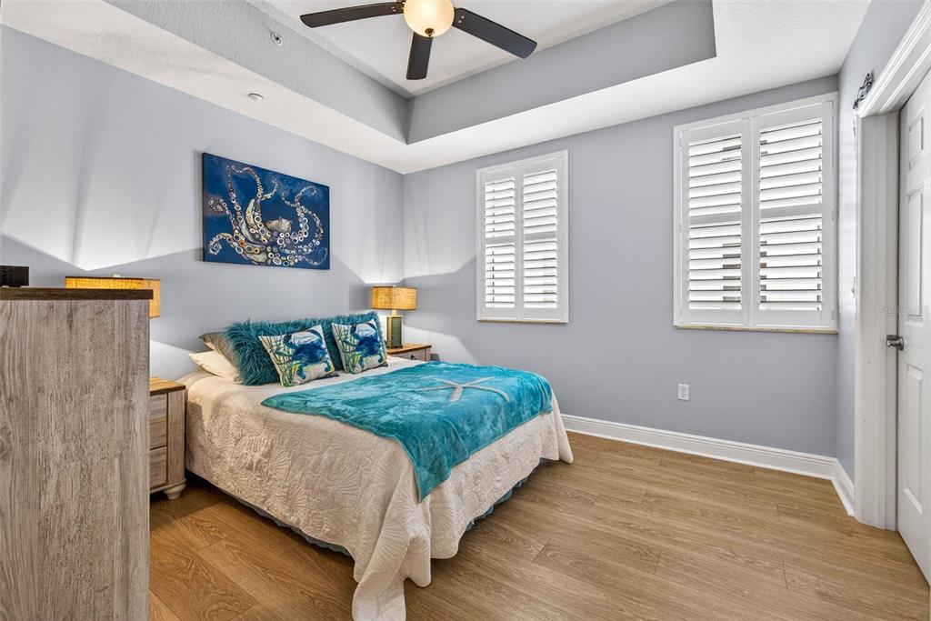 17717 Gulf Boulevard, Unit 401 Redington Shores, FL 33708 - Photo 17 of 66 a bedroom with bed and window