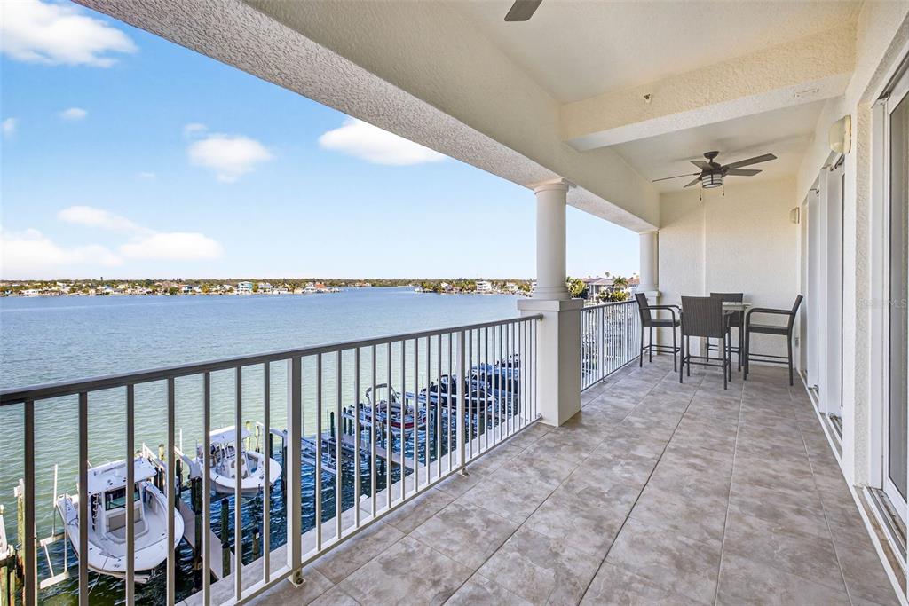 17717 Gulf Boulevard, Unit 401 Redington Shores, FL 33708 - Photo 35 of 66 a view of a balcony with chairs