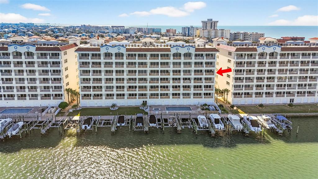 17717 Gulf Boulevard, Unit 401 Redington Shores, FL 33708 - Photo 46 of 66 a view of water with building and outdoor space