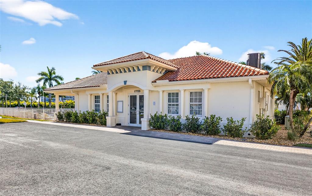 17717 Gulf Boulevard, Unit 401 Redington Shores, FL 33708 - Photo 47 of 66 front view of a house with a yard