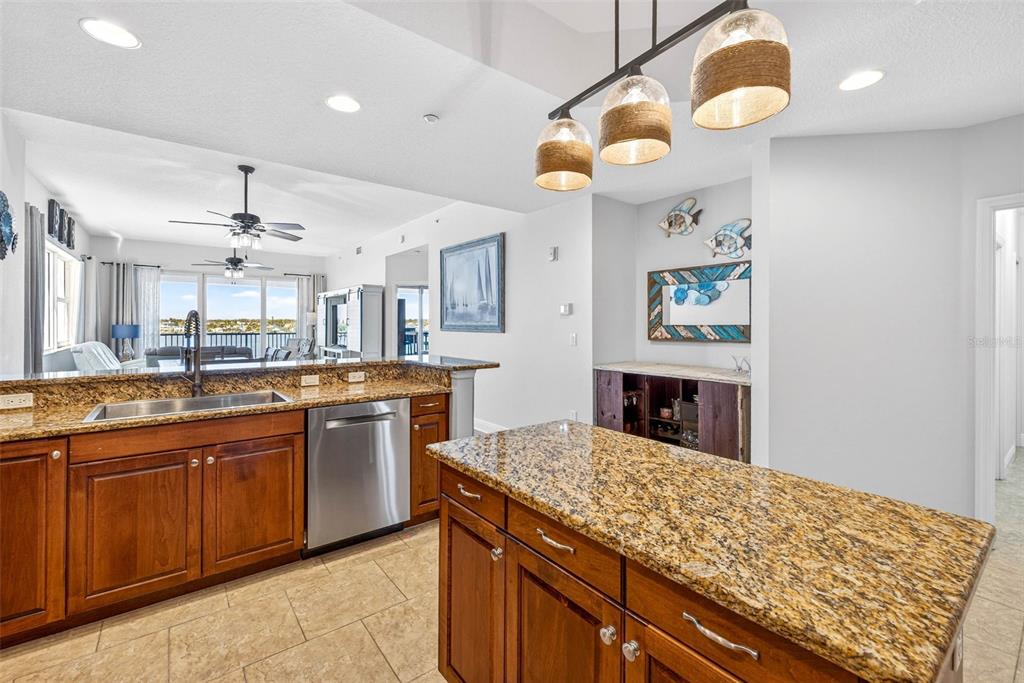 17717 Gulf Boulevard, Unit 401 Redington Shores, FL 33708 - Photo 10 of 66 a kitchen with sink and cabinets