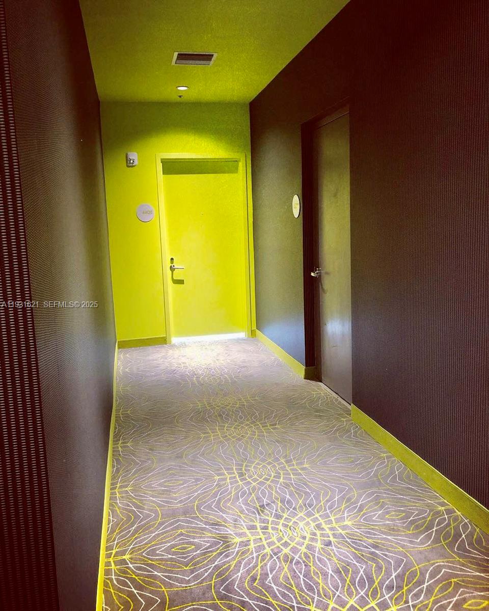 501 Northeast 31st Street, Unit PH4405 Miami, FL 33137 - Photo 13 of 18 a view of a room with a en suite bathroom