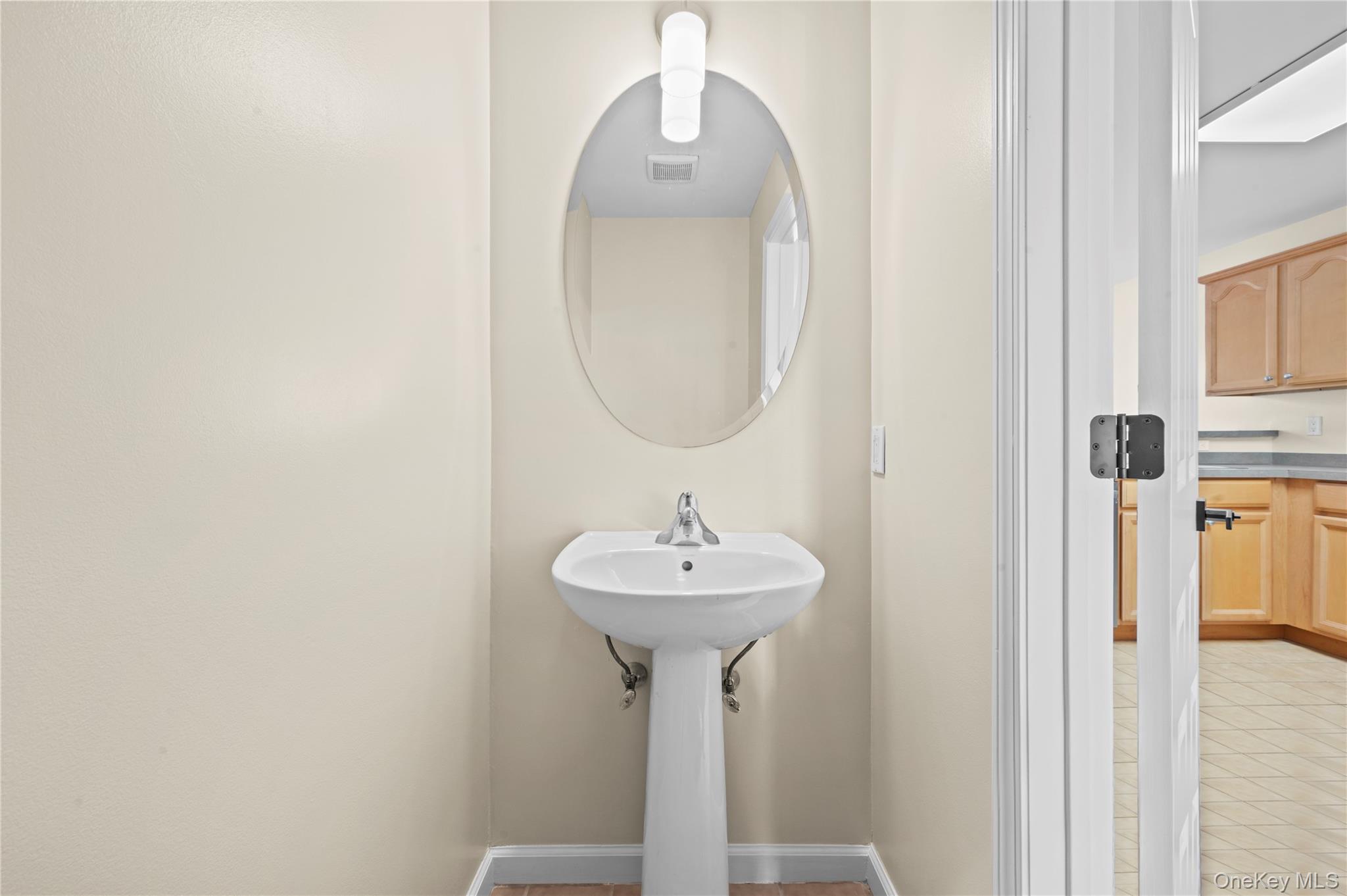19 Putters Way, Unit 9 Middletown, NY 10940 - Photo 16 of 22 Bathroom featuring light tile patterned flooring