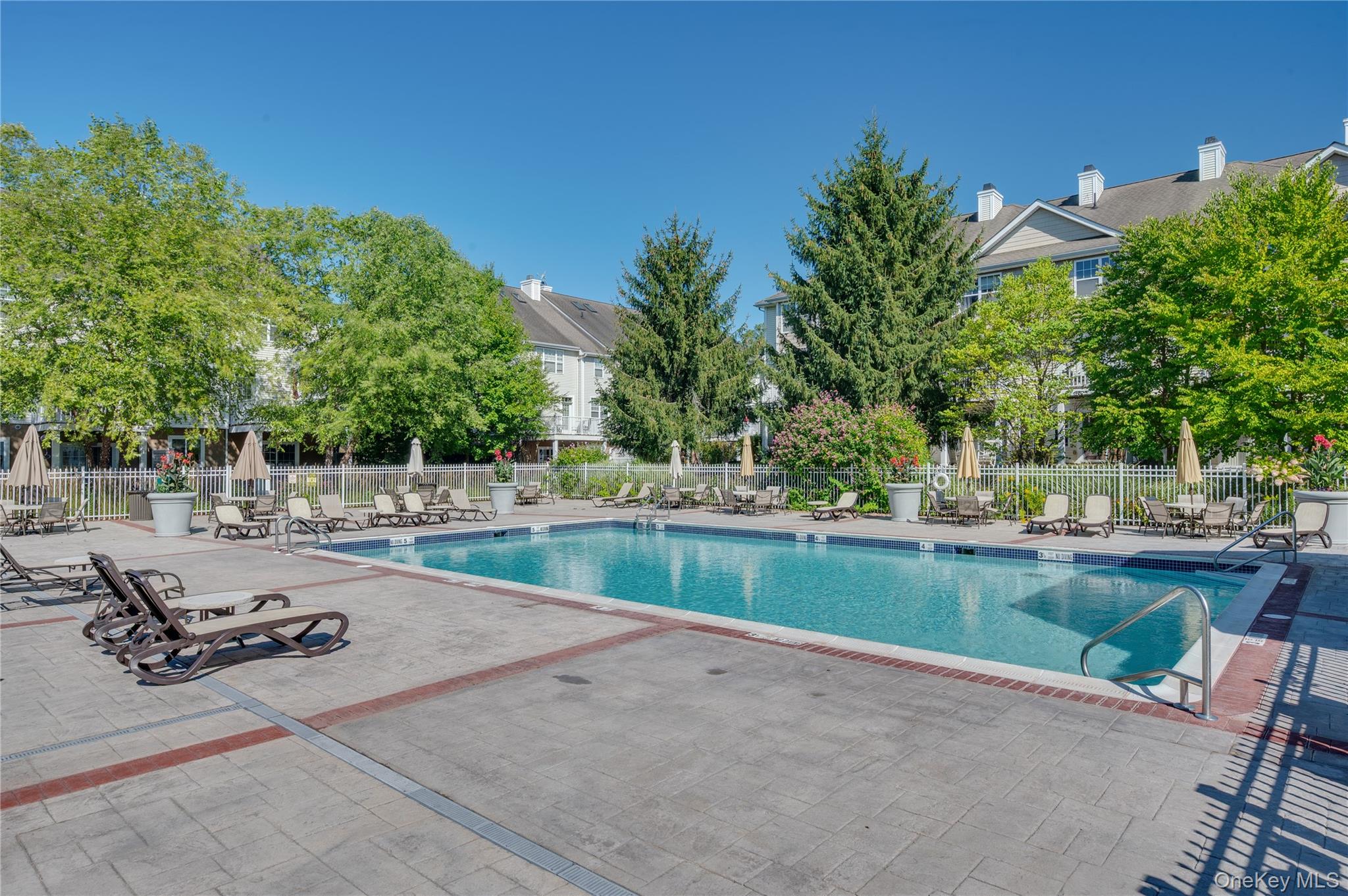 19 Putters Way, Unit 9 Middletown, NY 10940 - Photo 20 of 22 Community pool featuring a patio