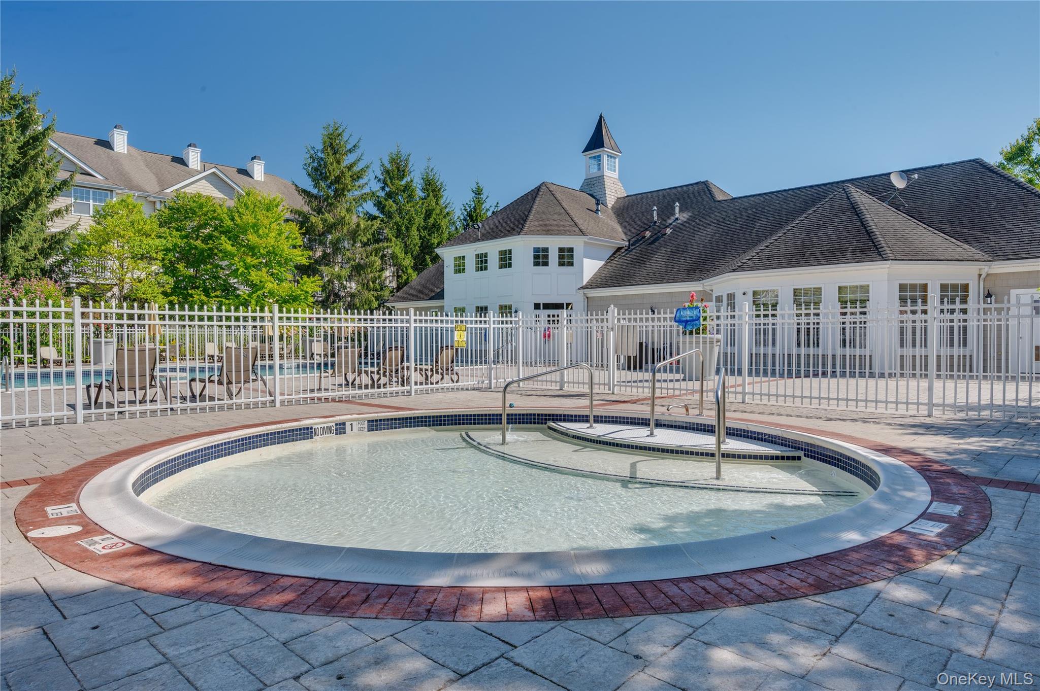 19 Putters Way, Unit 9 Middletown, NY 10940 - Photo 21 of 22 Community pool with a patio