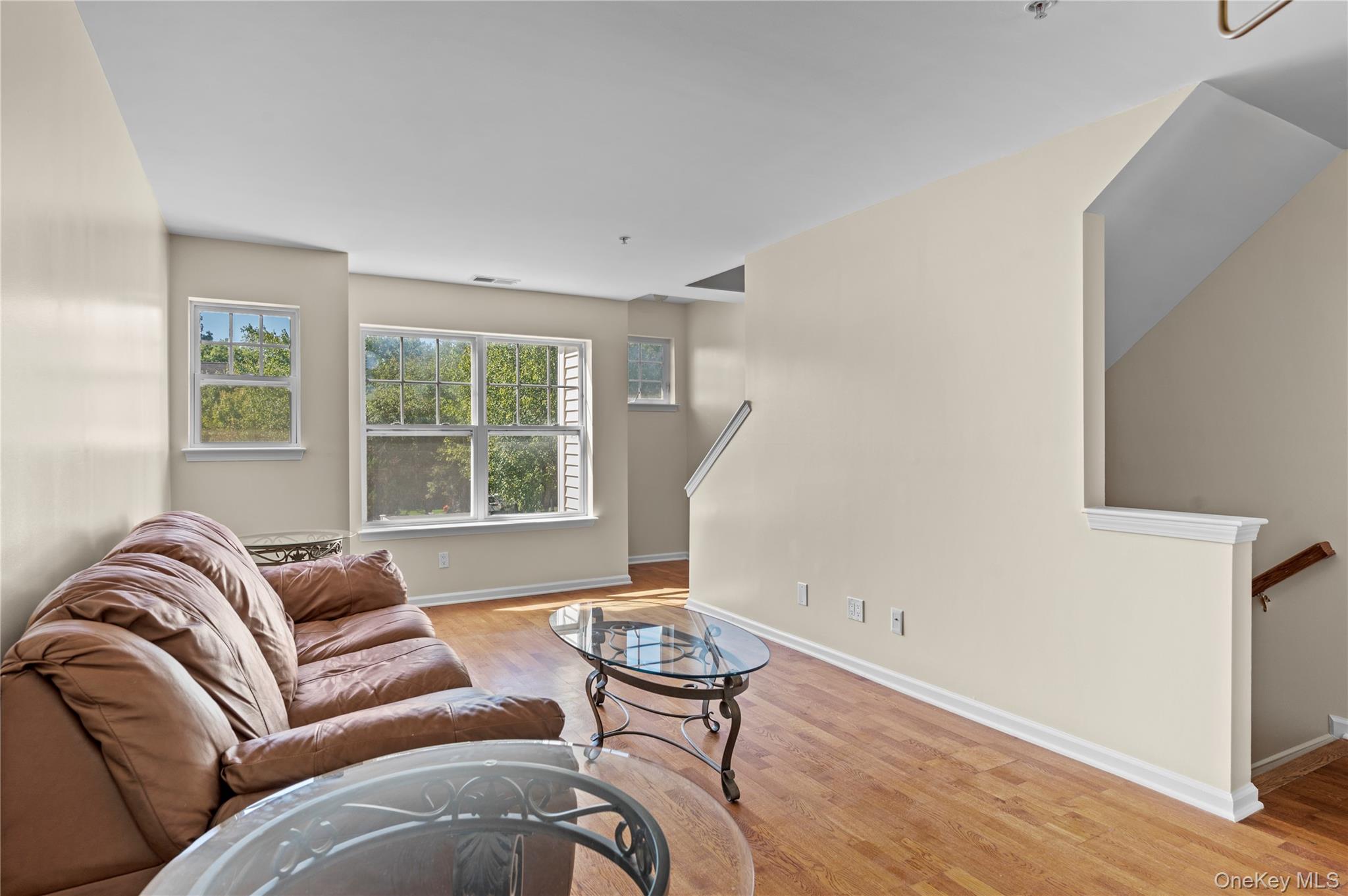 19 Putters Way, Unit 9 Middletown, NY 10940 - Photo 4 of 22 Living area with wood finished floors