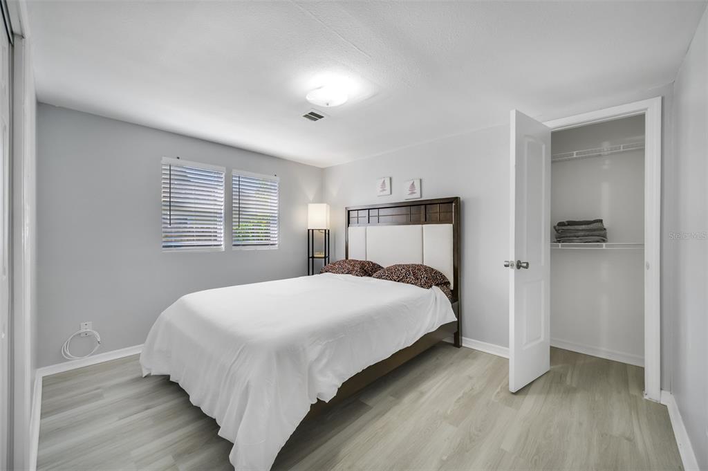 1601 Palm Way Largo, FL 33771 - Photo 20 of 25 a bedroom with a bed and a window