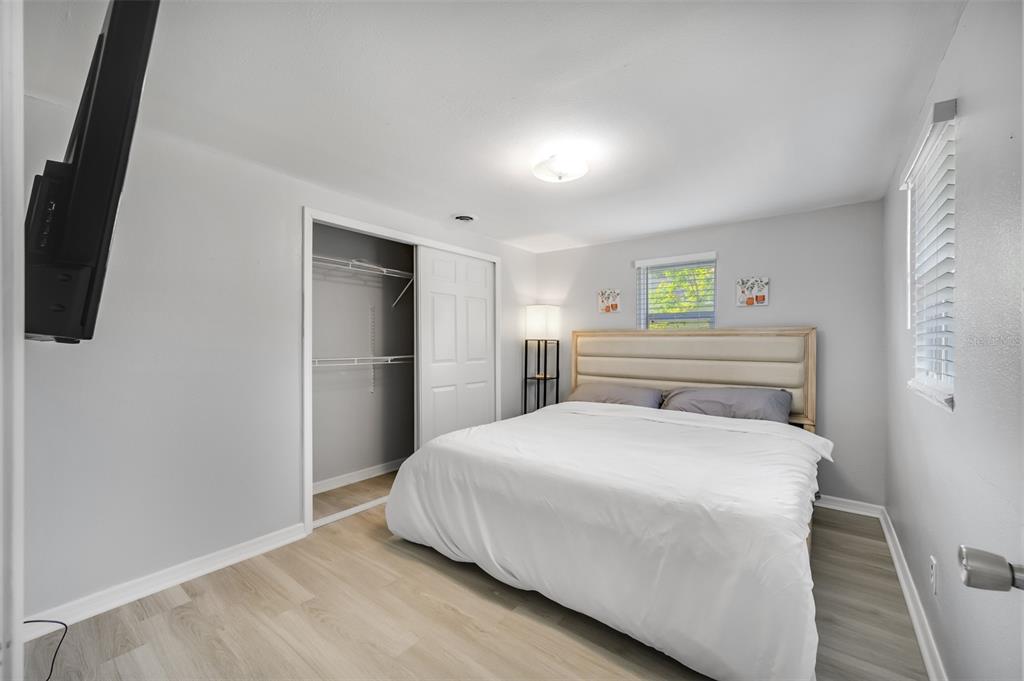 1601 Palm Way Largo, FL 33771 - Photo 23 of 25 a bedroom with a bed and a bathroom