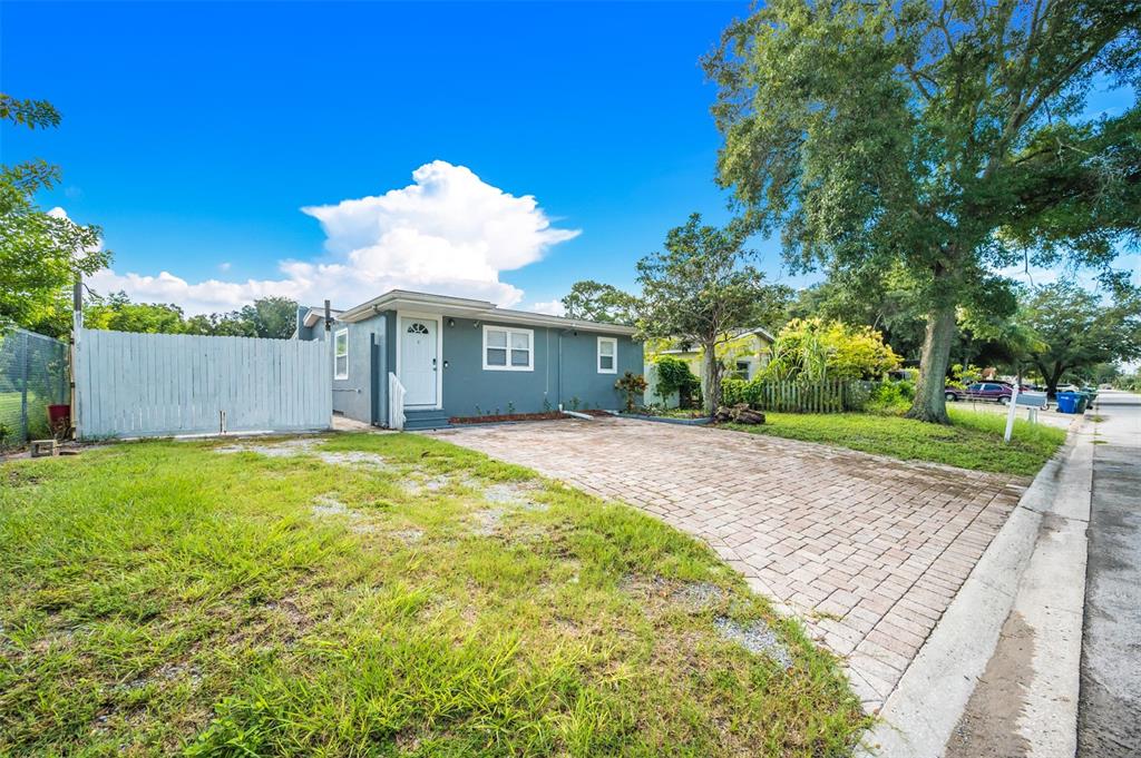 1601 Palm Way Largo, FL 33771 - Photo 3 of 25 a view of a house with a yard