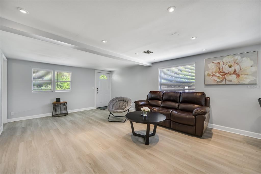 1601 Palm Way Largo, FL 33771 - Photo 4 of 25 a living room with furniture and a window