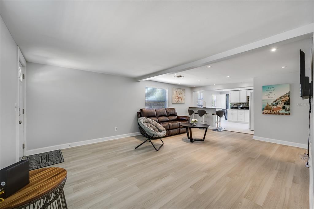 1601 Palm Way Largo, FL 33771 - Photo 7 of 25 a living room with furniture and a wooden floor