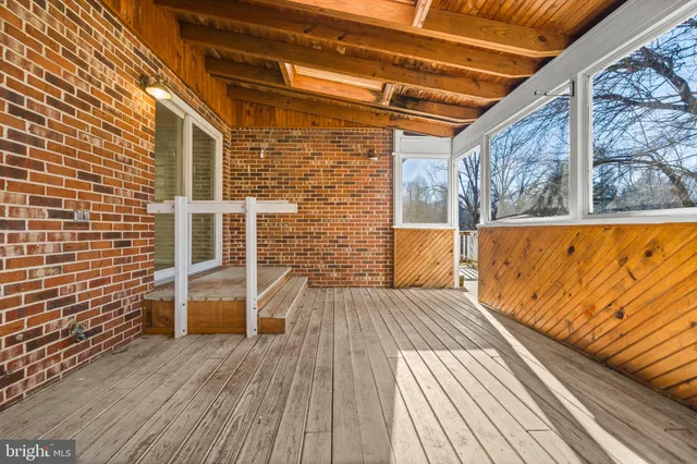 a bedroom with a bed furniture and a window