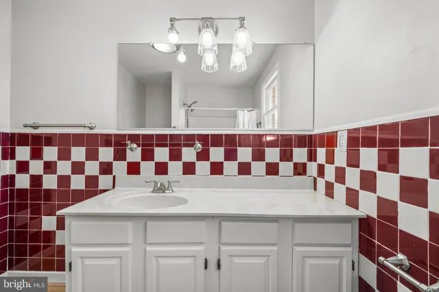 a kitchen with a stove and a sink