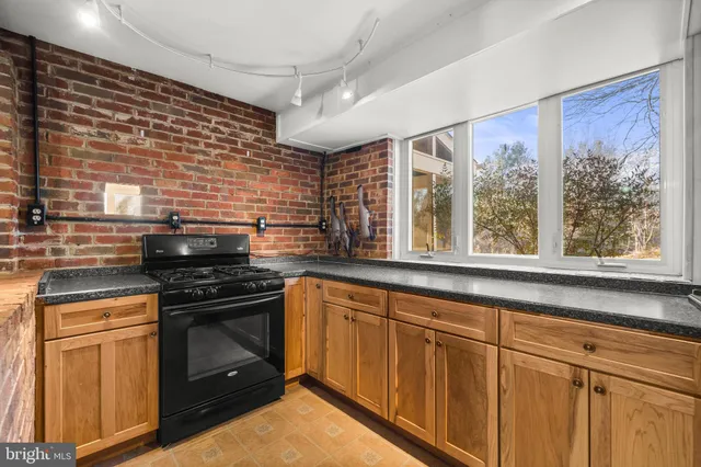 a bathroom with a sink and a large mirror