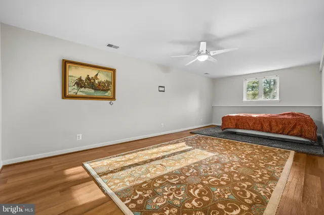 an aerial view of a house with a roof deck