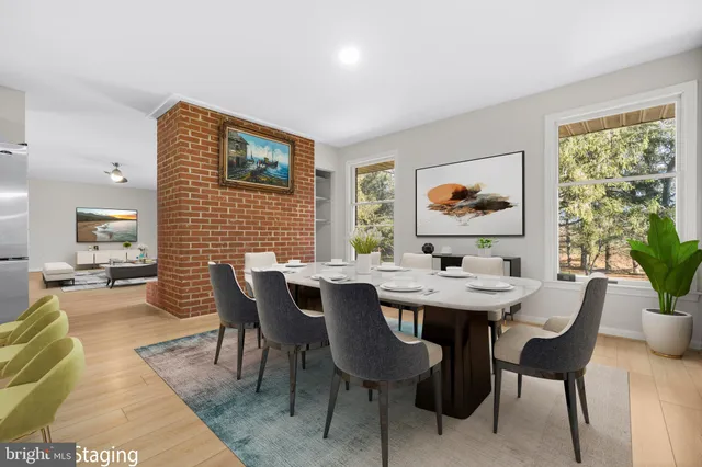 a kitchen with stainless steel appliances granite countertop a sink and a stove top oven
