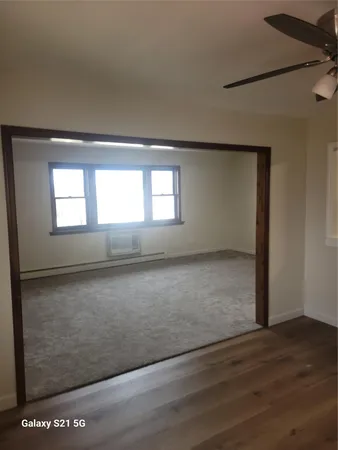 a view of a room with a sink and a window