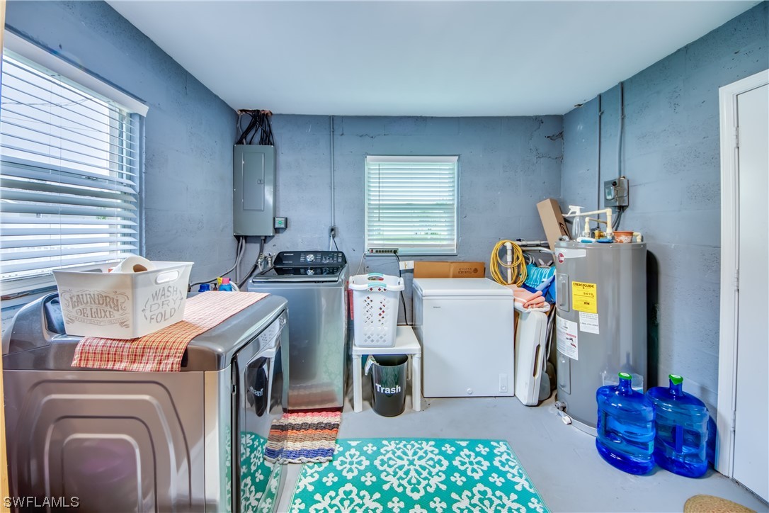 26508 Eager Road Punta Gorda, FL 33955 - Photo 35 of 41 a utility room with sink dryer and washer