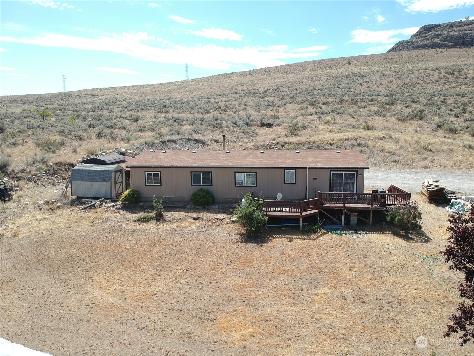 507 Mt Olive Road Riverside, WA 98849 - Photo 1 of 23 a view of a terrace with chairs