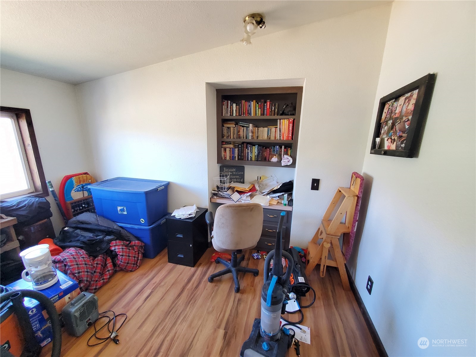 507 Mt Olive Road Riverside, WA 98849 - Photo 12 of 23 a workspace with furniture and wooden floor