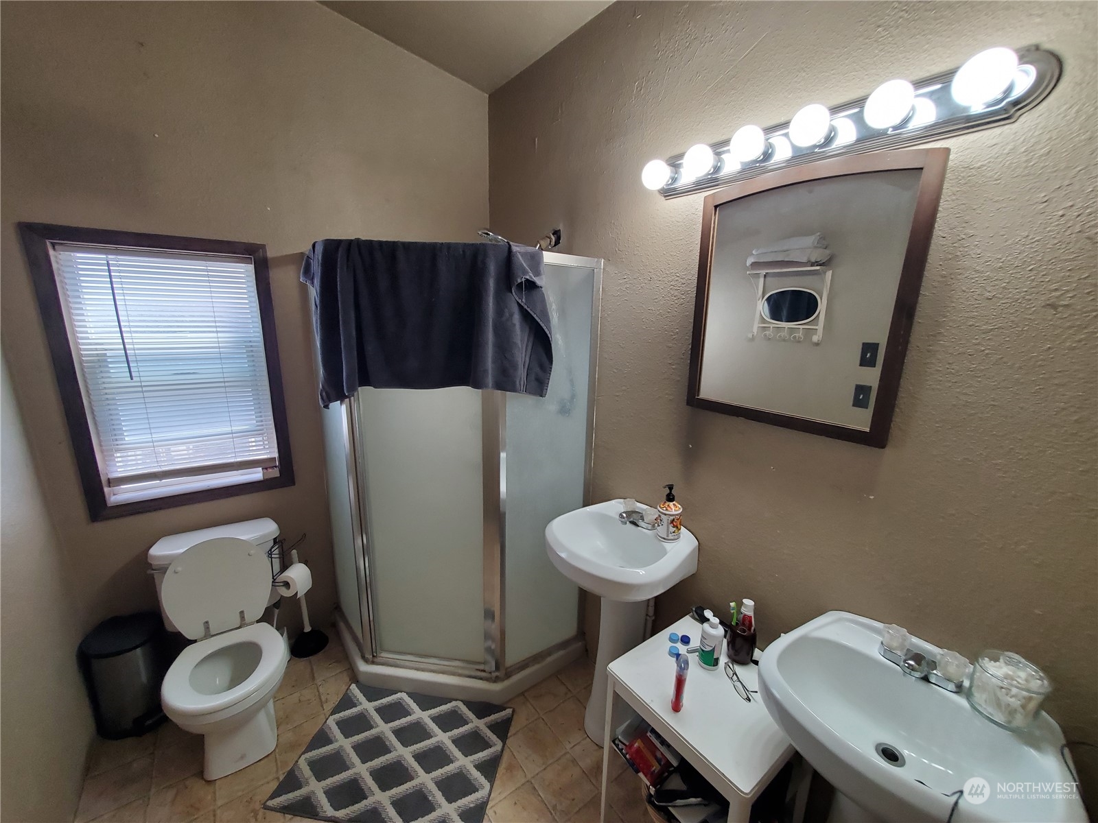 507 Mt Olive Road Riverside, WA 98849 - Photo 16 of 23 a bathroom with a toilet sink and mirror