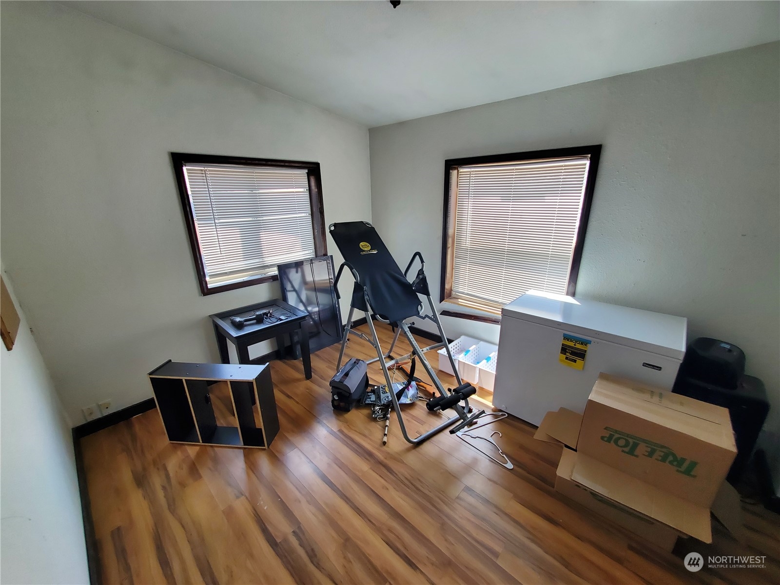 507 Mt Olive Road Riverside, WA 98849 - Photo 17 of 23 a view of a workspace with furniture and wooden floor