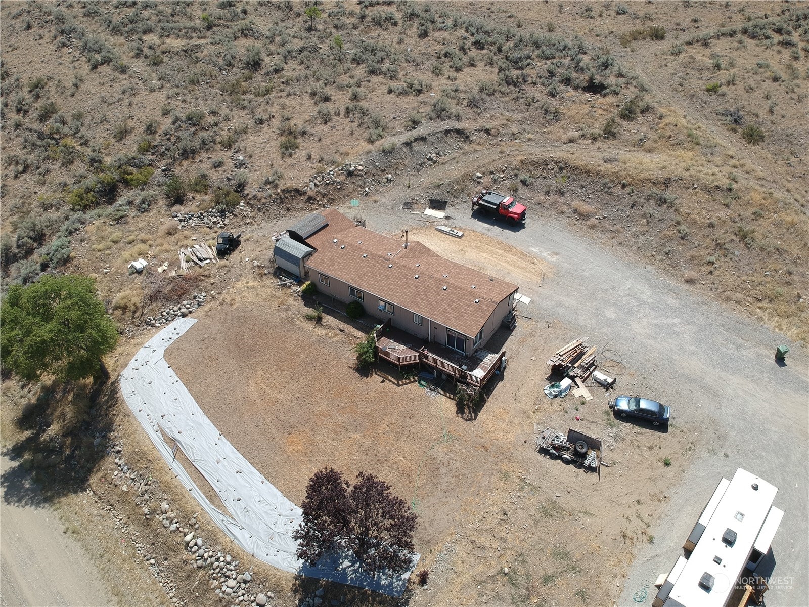 507 Mt Olive Road Riverside, WA 98849 - Photo 23 of 23 an aerial view of a house with a yard